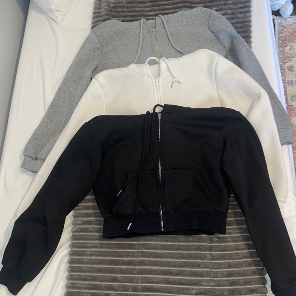 Three cropped zip ups